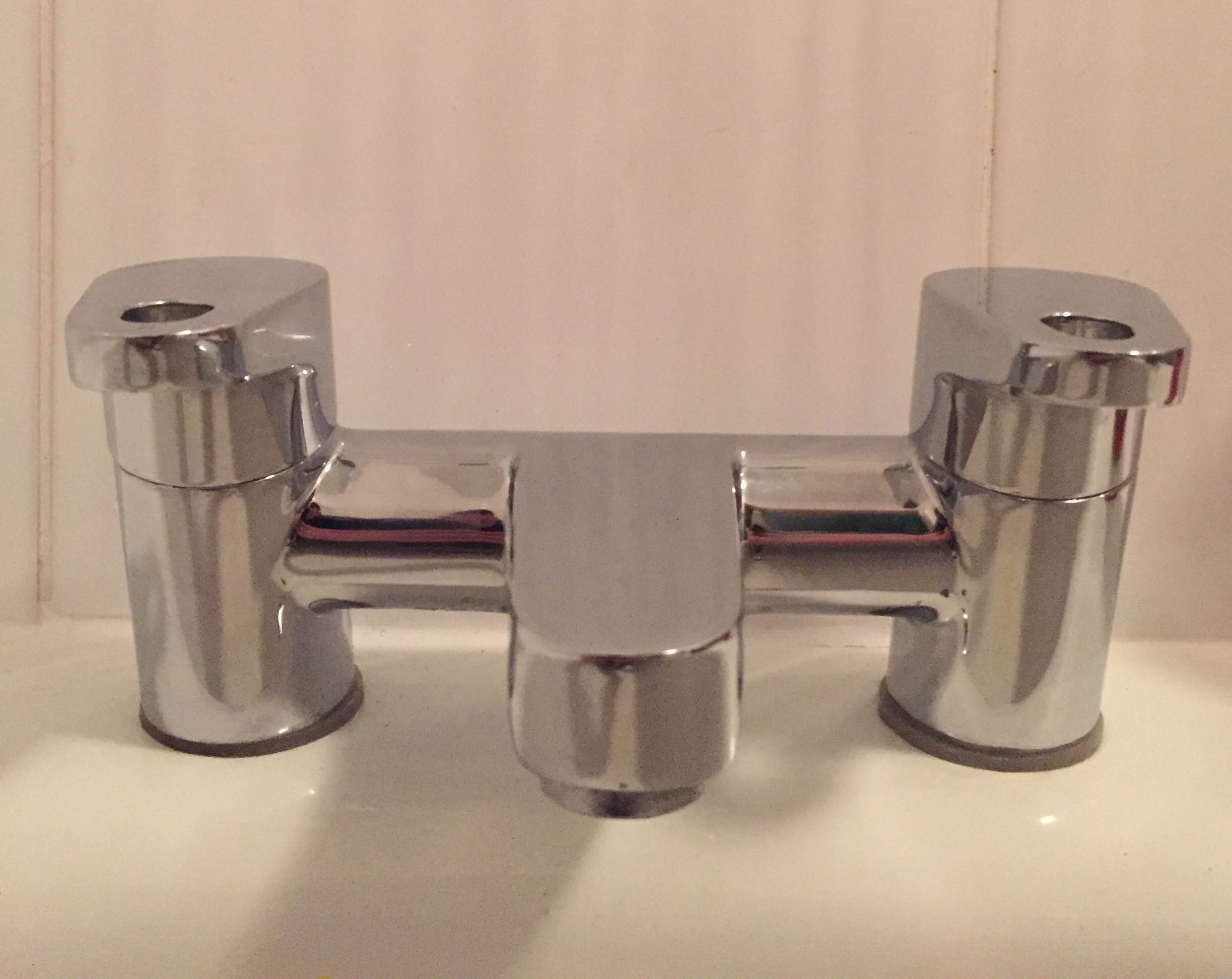 Bath tap fitting